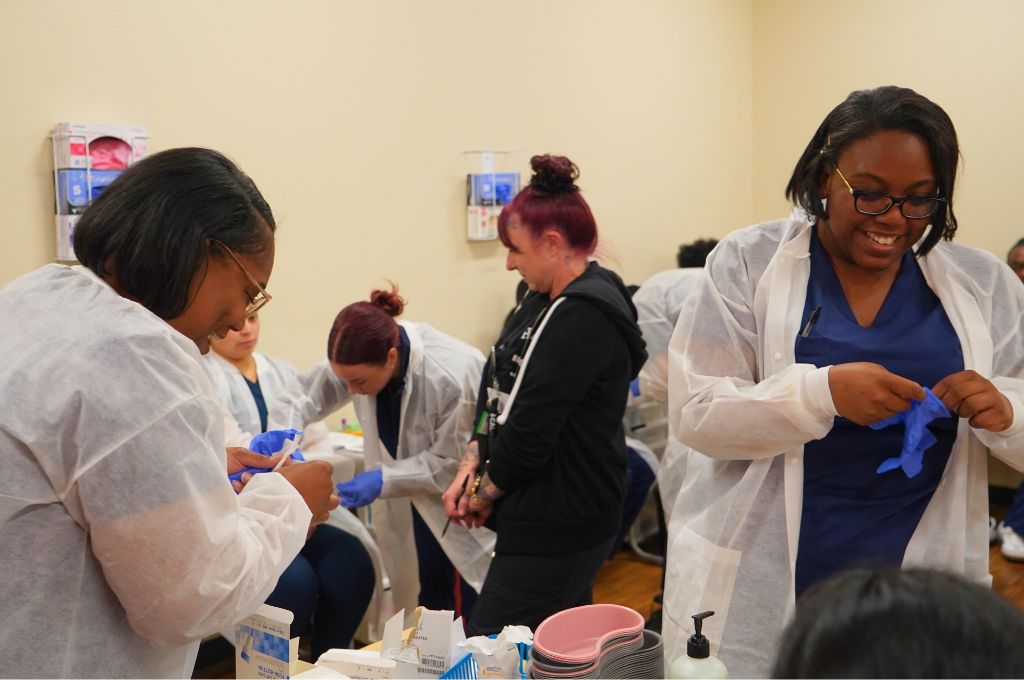 Students in Beaumont, CA preparing for phlebotomy lab practice as part of CALRegional-administered training at Beaumont Adult School.